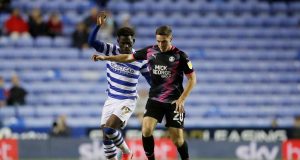 Reading's Tom Dele Bashiru in action with Peterborough United's Conor Coventry