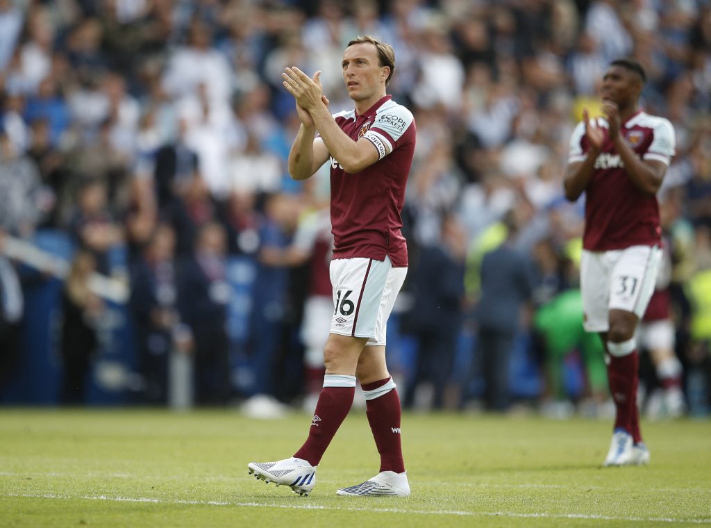 West Ham United's Mark Noble applauds fans after the match
