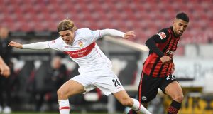 VfB Stuttgart's Borna Sosa in action with Eintracht Frankfurt's Aymen Barkok
