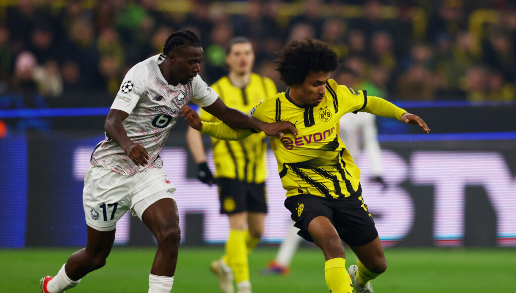 Borussia Dortmund's Karim Adeyemi in action with Lille's Ngal'Ayel Mukau. (REUTERS/Thilo Schmuelgen)