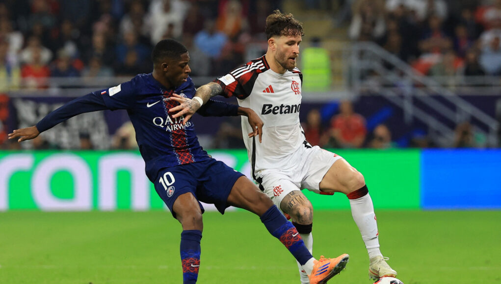 FIFA Intercontinental Cup - Final - Paris St Germain v Flamengo Paris St Germain's Ousmane Dembele in action with Flamengo's Leo Pereira. (REUTERS/Thaier Al-Sudani)