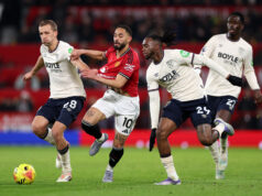 Matheus Cunha of Manchester United and Tomas Soucek and Aaron Wan-Bissaka of West Ham United . (Justin Setterfield/Getty Images)