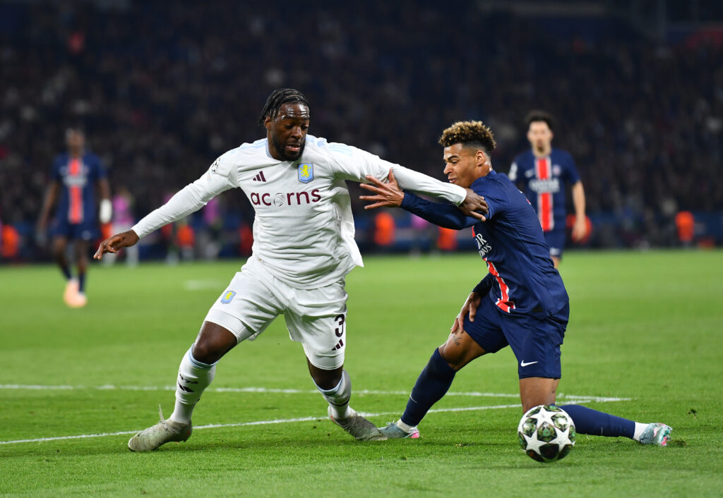 Disasi playing for Villa v PSG